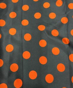 Tissu carnaval imprimé fond noir pois rouge