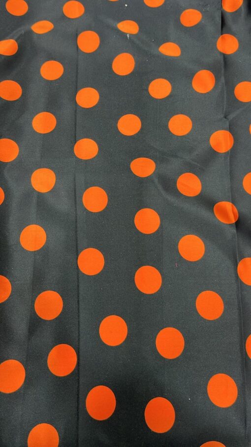 Tissu carnaval imprimé fond noir pois rouge