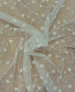 Tulle brodé blanc irisé