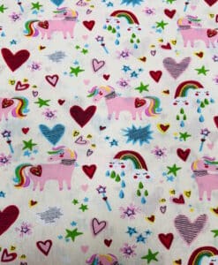 Coton imprimé licorne arc en ciel