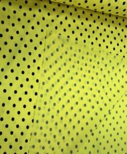 Crêpe polyester fond jaune pois noirs