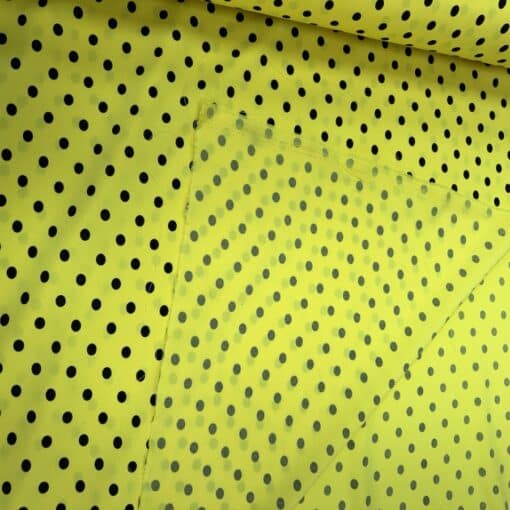 Crêpe polyester fond jaune pois noirs