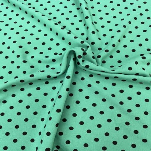 Crêpe polyester fond vert canard pois noirs