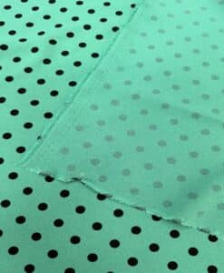 Crêpe polyester fond vert canard pois noirs