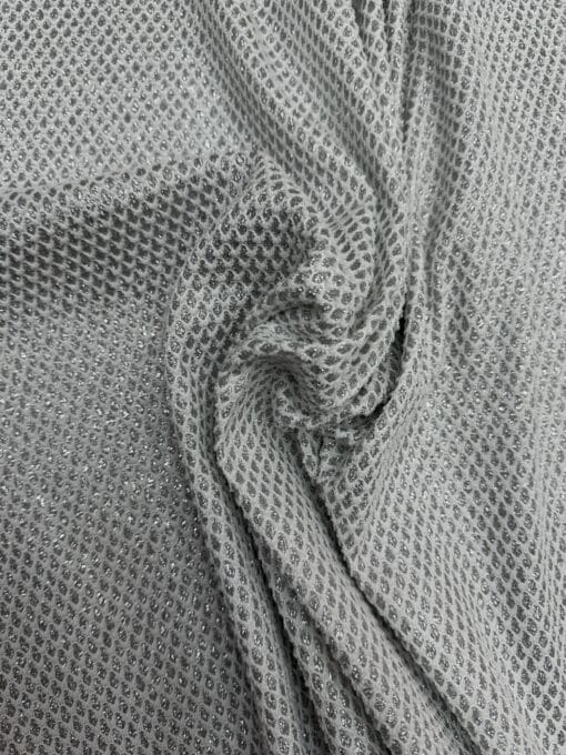 Tissus fond blanc  à gouttes pailleté argent