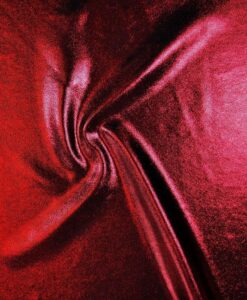 Lycra pailleté multipoint fond noir pailleté rouge