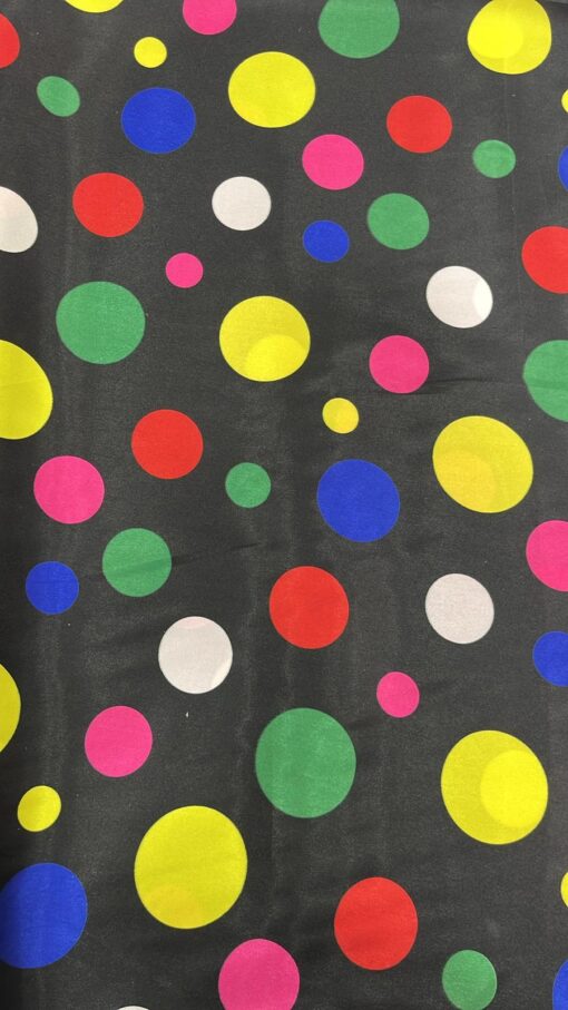 Tissu carnaval imprimé fond noir pois multicolors