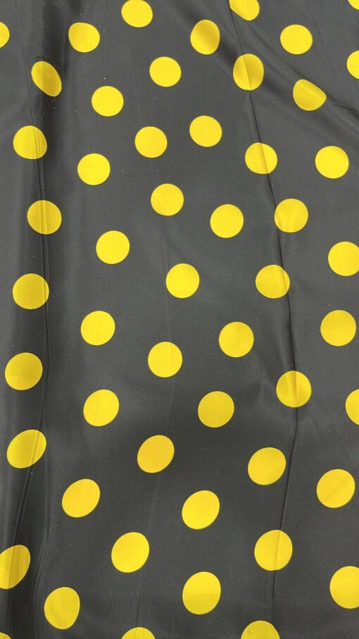 Tissu carnaval imprimé fond noir pois jaune