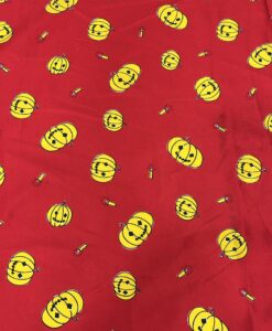 Tissu carnaval imprimé fond rouge citrouille