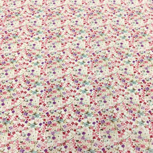 Tissu coton fleuris rose du dessert