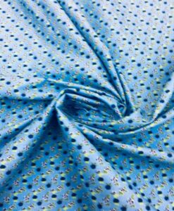 Tissu coton motif fleuris bleu ciel
