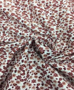 Tissu coton motif fleuris bordeaux