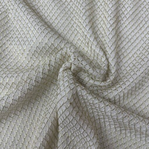 Tissu effet cotte de maille blanc et or