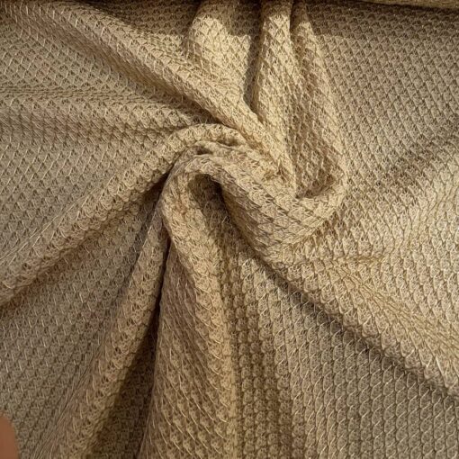 Tissu effet cotte de maille or