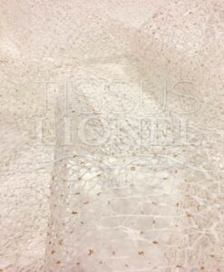 Tissu filet écru pailleté or