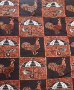 Tissu wax coq sous la pluie
