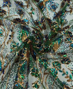 Tulle pailleté fleuri changeant vert et bleu or hologramme